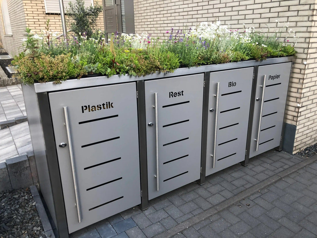 Wurzelwerk Design Plantile Dachbegrünung BioTop+ mit 10 Blühstauden auf begrüntem Dach, grüne Pflanzen und bunte Blüten sichtbar