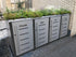 Wurzelwerk Design Plantile Dachbegrünung BioTop+ mit 10 Blühstauden auf begrüntem Dach, grüne Pflanzen und bunte Blüten sichtbar