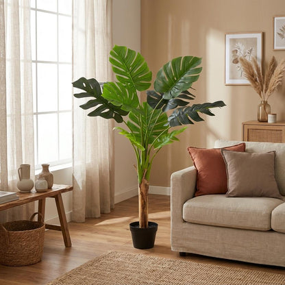 Kunstpflanze Monstera Deliciosa von Everspring, 45-180 cm, mit charakteristischen Löchern in den großen grünen Blättern.